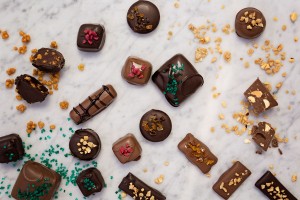 A selection of truffles with candy toppings and quinoa