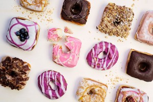 Artisan donuts with candied bacon, toppings, nuts