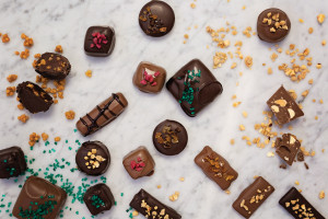 Chocolate truffles with candy and agave glazed quinoa